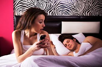 signs of infidelity - hiding cell phone